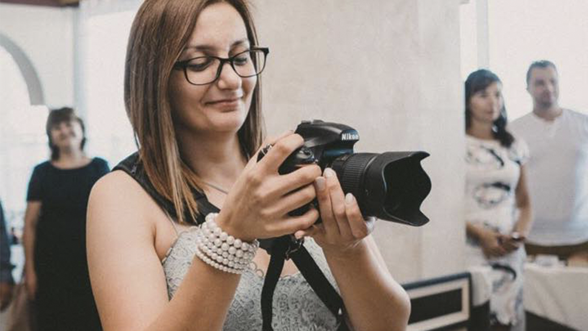 Photographer with Nikon